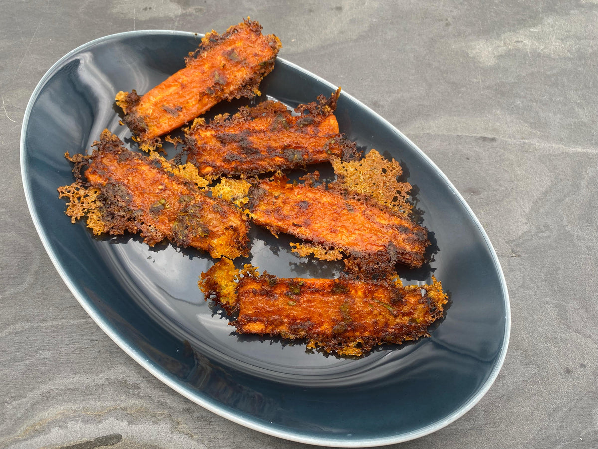 Knusprige Ofen-Karotten mit Speck und Parmesan